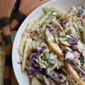 Creamy Cabbage & Carrot Coleslaw with Apple - It's so easy to transform a simple bag of pre-shredded green cabbage, red cabbage, and carrots into an absolutely outstanding side salad. This particular creamy coleslaw recipe is made even more delicious with the addition of a crisp red apple and crunchy sunflower seeds. I'm fairly certain that this time-saving slaw is going to become one of your new favorite go-to summer recipes.