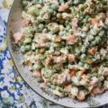 Crunchy Pea Salad with Creamy Buffalo Sauce - If you're a crunchy food superfan, this is one side salad you're definitely going to want to try this summer. Diced celery and carrots give an amazing crunch to this cheesy pea salad. And, once you add in a creamy homemade buffalo sauce made with hot sauce, honey, sour cream, and a few other ingredients, I think that you'll find this pea salad has just as much flavor as it does crunch.