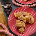 Raspberry & Peanut Butter Glazed Crescent Rolls - Are you a huge PB&J fan? Are peanut butter and jelly two of your favorite can't live without ingredients? If so, you're going to totally swoon over these raspberry and peanut butter glazed crescent rolls. I mean, how can you resist a crescent roll stuffed with raspberry preserves, jam, or jelly? Especially when it's topped with a smooth, creamy, and decadent peanut butter glaze.