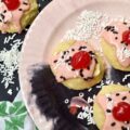 Amish Buttermilk Vanilla Sundae Cookies - These buttermilk Amish cookies are soft, dreamy, flecked with vanilla bean seeds, and covered in a sweet, creamy, decadent cherry juice and vanilla-infused icing. To create charmingly adorable and irresistible cakey sundae cookies no one can resist, simply sprinkle on a few sprinkles and top with half a maraschino cherry.