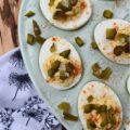 Southern Sweet Pickle Deviled Eggs - Southern sweet pickle deviled eggs are a great choice for any occasion, whether you're in need of a quick snack, a side dish, or perhaps an appetizer to start off a meal. The combination of mayonnaise, pickle juice, and dry mustard creates a tangy and savory flavor that is perfectly balanced with a touch of sweetness. And, the garnish of diced sweet pickle, paprika, and flaky sea salt adds just the right hint of flavorful salty sweetness to make these deviled eggs absolutely irresistible.