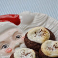 Hot Chocolate Brownie Cookies - When it comes to winter treats, it can be hard to choose between hot chocolate, brownies, and cookies. But why choose when you can have all three in one cookie? These delicious cookies have a lovely brownie texture, are bursting with chocolaty goodness, and are topped with melted marshmallows just like the best hot chocolate. They're the perfect cookie to celebrate a snow day with.