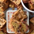 Chocolate Chip Cookie Blondies with M&M's - Get ready to satisfy your sweet tooth with these irresistible chocolate chip cookie blondies. These delicious bar cookies are the perfect sweet treat, boasting a soft and gooey center with thick, baked crunchy edges. And, since these blondies are so easy to customize with seasonal M&M's, they're an excellent festive dessert option for almost any occasion.