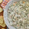 Classic Homemade Spinach Dip (No Soup Mix) - What makes this classic spinach dip truly special is its delicious homemade blend of herbs and seasonings. By skipping the packet of store-bought soup mix, you get a fresh and vibrant taste that pre-packaged versions simply can’t compete with. The result is a creamy, flavorful dip that's perfect for pairing with your favorite crackers, chips, or pretzels. This quick and easy homemade spinach dip is sure to be a hit at your next gathering.