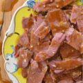 Maple Sugar Crockpot Corned Beef - Forget complicated cooking methods and lengthy ingredient lists; this incredibly easy slow cooker corned beef brisket recipe results in tender, melt-in-your-mouth corned beef with minimal effort. Simply place everything into your slow cooker, set it, and walk away. The real magic happens when the slowly cooked corned beef is glazed with a sweet and spicy mixture of brown sugar, Dijon mustard, maple syrup, and horseradish. A quick bake in the oven transforms this sauce into a golden, bubbly delight, creating a memorable corned beef dish that is sure to be a family favorite.