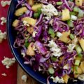 Fresh Peach & Ramen Noodle Red Cabbage Slaw - This vibrant slaw marries the satisfying crunch of crisp red cabbage with the mellow sweetness of juicy, ripe peaches. An unexpectedly perfect match. Fresh chopped scallions and aromatic basil add a pop of color and flavor, while an easy-to-make soy dressing ties everything together. But the real game-changer? The generous addition of toasted sesame seeds and crispy ramen noodles ensures that each bite delivers an irresistible burst of crunchy texture. Light, flavorful, and incredibly refreshing, this side dish is exactly what your hot summer day has been craving.
