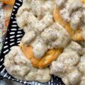 Weeknight Sweet Italian Sausage Gravy with Beer - Let's face it, some nights, making a complicated dinner just feels like too much. You're tired, hungry, and honestly, breakfast for dinner sounds much better and more comforting than heating up a frozen pizza. On those nights, this Weeknight Sweet Italian Sausage Gravy with Beer makes things a little easier and a whole lot tastier. This easy skillet recipe brings together sweet Italian sausage, beer, whole milk, and heavy cream to make a gravy that is rich, creamy, and a little sweet, simply seasoned with salt, pepper, and the flavor from the browned sausage. With this easy-to-make, delicious one-pan recipe, sausage gravy isn't just for breakfast anymore.