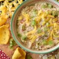 Parmesan & Cheddar Pimento Corn Chip Dip - If you're a wimp when it comes to spicy food, this flavorful Parmesan and Cheddar corn chip dip is for you. It's creamy, cheesy, absolutely packed with diced pimento, and full of flavor, without the heat found in most traditional corn chip dips. Paired with crunchy corn chips, it's the ultimate party starter, game day snack, or stay-at-home movie-night treat. And, if you’re the type of person who likes to live dangerously and crank up the heat, go right on ahead and fold in a finely chopped jalapeño. Don't be afraid to play around with the ingredients in this recipe and make it your own.
