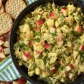Mild Curry Chicken Salad with Diced Red Apples - This mild curry chicken salad features tender shredded rotisserie chicken tossed in a creamy, golden dressing that brings all the aromatic warmth of curry without the fiery heat. Paired with the sweet, crunchy snap of diced red apples, it's a light, flavorful chicken salad perfect for serving on crispy wheat crackers or for making sandwiches. Whether you stir in a handful of fresh cilantro for an herbal pop of bright color or opt for scallions, parsley, celery, or onion instead, this chicken salad is sure to be an instant favorite.