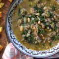 Weeknight Italian Sausage & Spinach Bean Soup - Loaded with savory mild Italian sausage, creamy canned beans, and tender baby spinach, this Italian herb-infused soup is simple to make, budget-friendly, and easy to adapt. You can use homemade or store-bought chicken broth, or even add more vegetables like carrot, butternut squash, or sweet potato. Finish this bean soup with a generous sprinkle of freshly grated Parmesan or a handful of crunchy, simple homemade baked croutons for an effortless one-pot meal that turns a chaotic weeknight into a cozy night in.